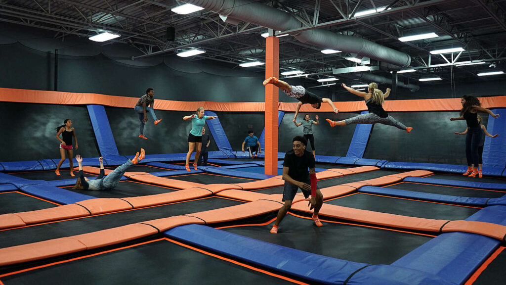 People jumping on trampolines at Sky Zone